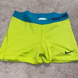 Lime green and blue Nike pro shorts